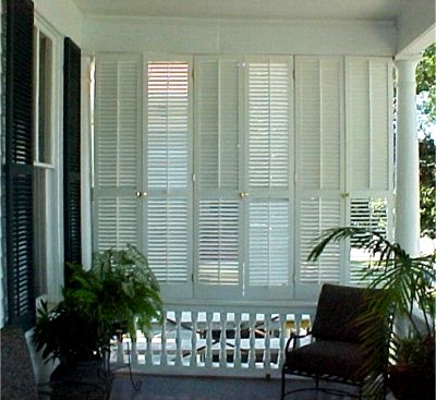 Plantation Shutters used to enclose a porch