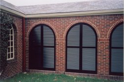 Arched exterior shutters