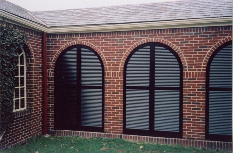 arched louvered exterior shutters