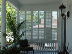 1.7/8" Traditional operable louvers, exterior spanish cedar shutters used to block the wind and provide privacy on a second story porch