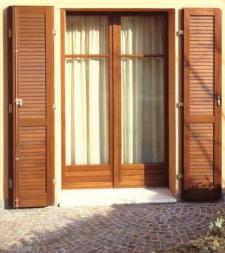 European tilt turn doors (style D12B) in Iroko wood with clear finish.