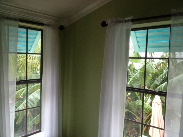 Bahama shutters as window awnings
