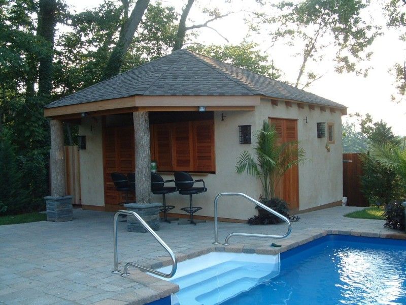 fixed louvered exterior shutters on a pool cabana